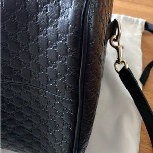 Gucci Guccissima bag with strap.